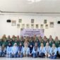 Mahasiswa KKN 02 Universitas Yudharta Pasuruan bersama Dosen Pembimbing Lapang dan TP PKK Desa Pajaran usai pelatihan pengolahan jagung di Balai Desa Pajaran pada Jumat, 10 Juli 2026. ©okedaily.com [foto: Andrean Masrofie]
